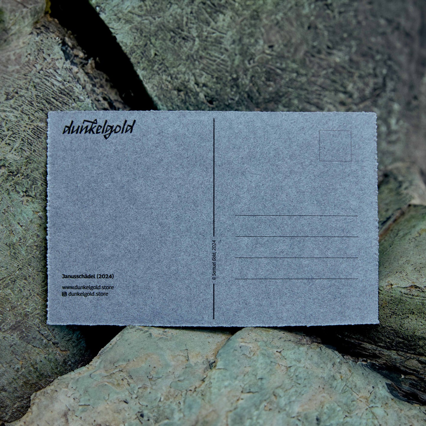 Postkarte "Janusschädel" in Filzoptik